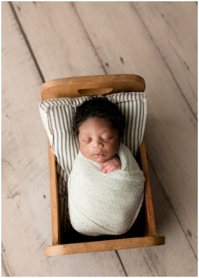 sleeping baby in bed, Mckinney newborn photographer 