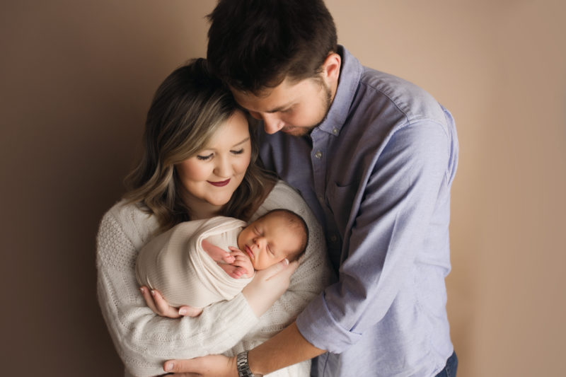 mom and dad family portrait with newborn, frisco newborn photographer