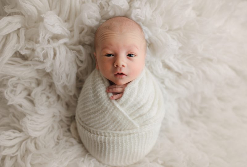 newborn swaddled in white, eyes open, prosper newborn photos baby hunter