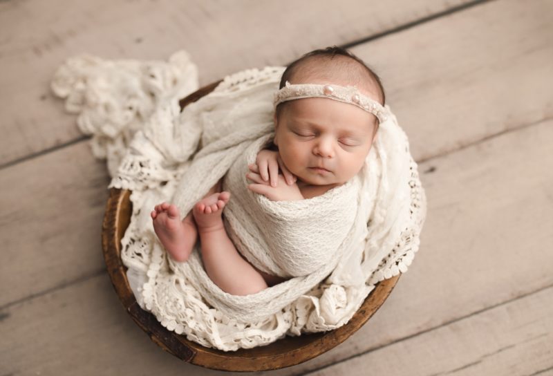 newborn girl swaddled in white on white knit blanket, frisco newborn photo session baby livia
